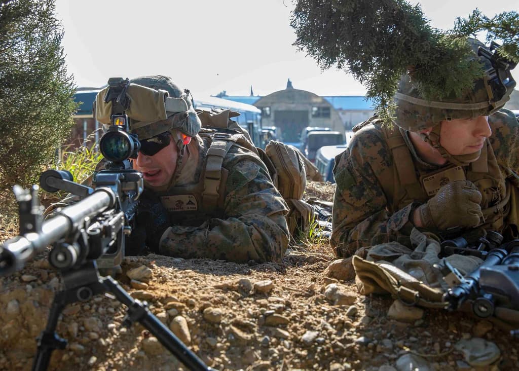 U.S. Marines assigned to Battalion Landing Team, 1st Battalion, 2nd Marine Regiment, 22nd Marine Expeditionary Unit, practice immediate action drills with a M24