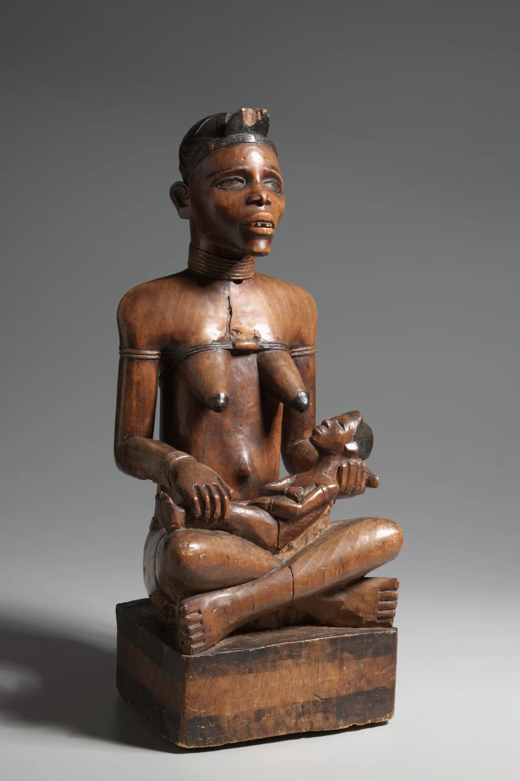 The Kongo people inhabit a large territory now divided among the nations of Congo, Democratic Republic of Congo, Cabinda, and Angola. The mother and child theme