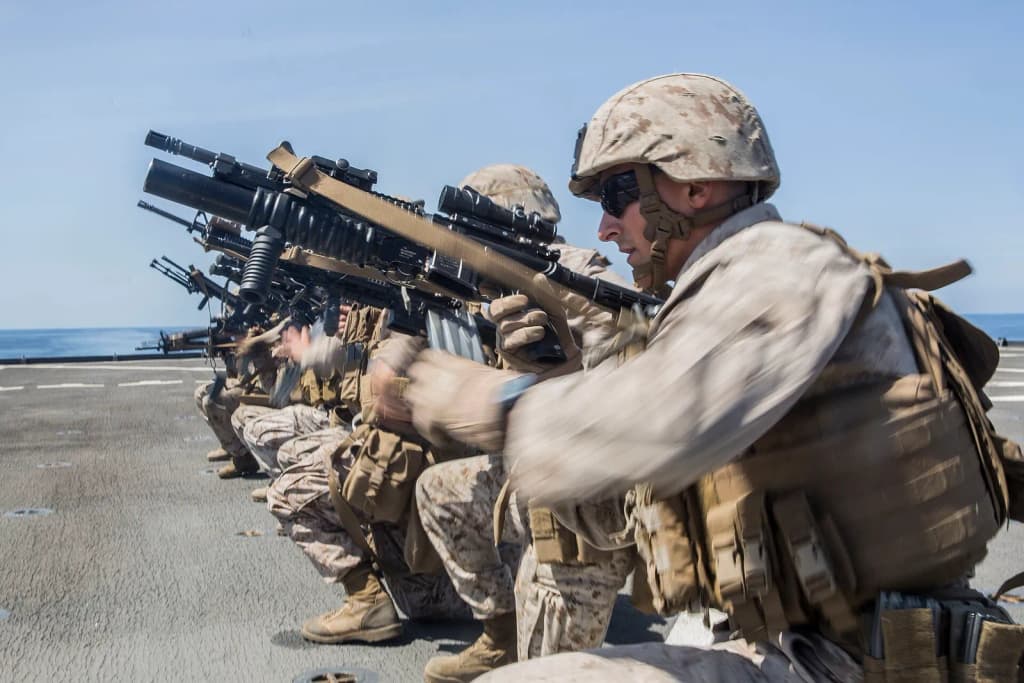 U.S. Marine Cpl. Joseph Burk executes speed-reload drills aboard the USS Rushmore (LSD 47) during Certification Exercise (CERTEX) off the coast of San Diego Apr