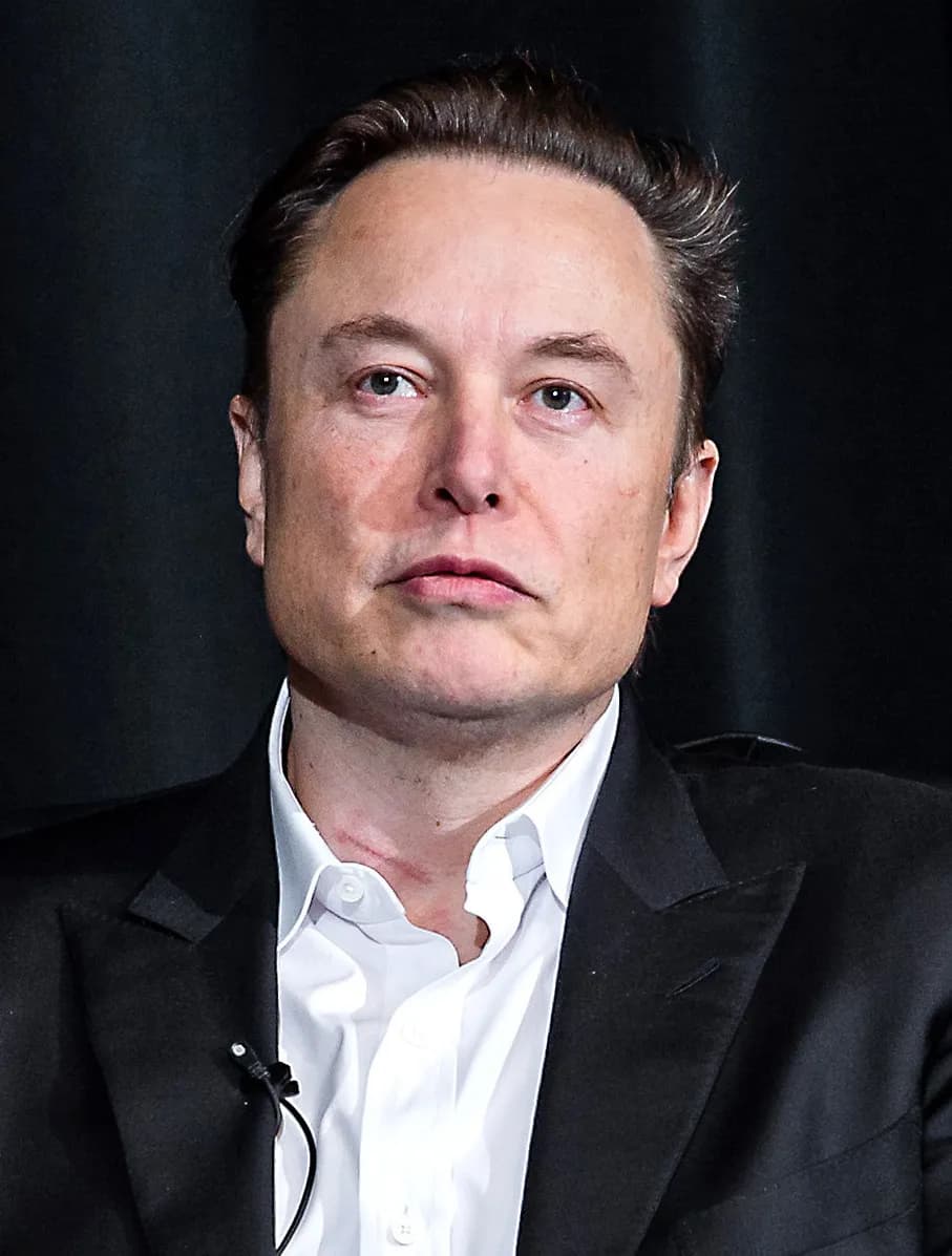 U.S. AIR FORCE ACADEMY, Colo. -- Tesla Inc. Chief Executive Officer Elon Musk speaks with Lt. Gen. Richard Clark, Superintendent of the U.S. Air Force Academy,