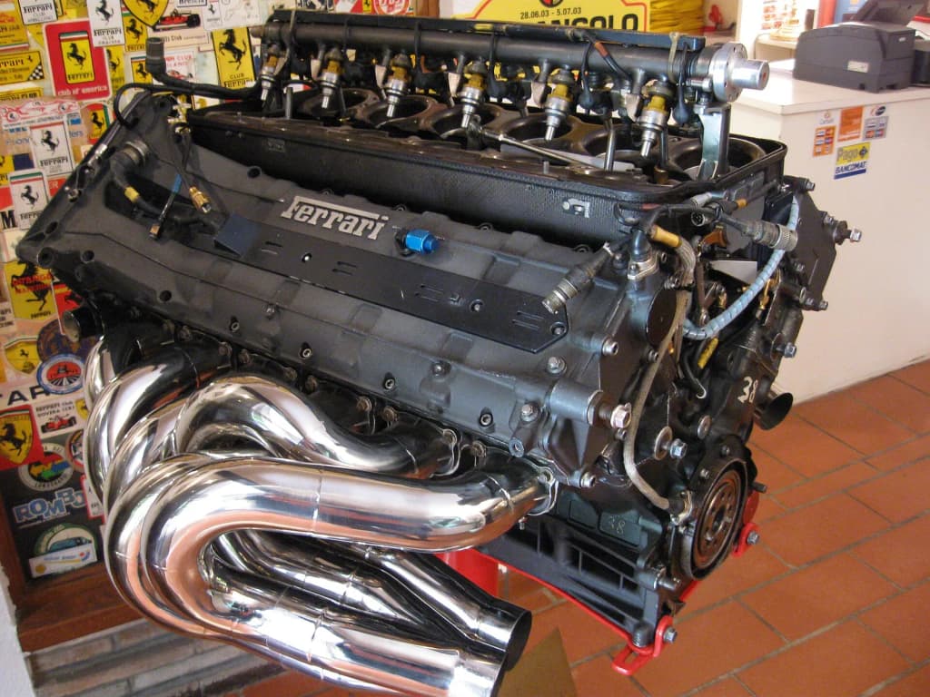Ferrari V12 Tipo 044 Formula One Grand Prix racing engine (1995 season) at Cavallino Restaurant in Maranello Italy