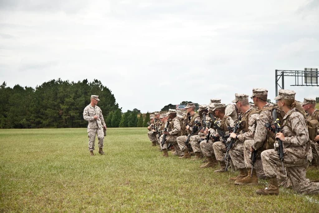 U.S. Marine Corps Sgt. Christopher L. Guthrie, combat instructor, Delta Company, Infantry Training Battalion (ITB), School of Infantry - East (SOI-E) instructs