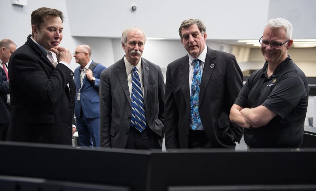 SpaceX CEO and Chief Designer Elon Musk, left, NASA Associate Administrator for the Human Exploration and Operations Mission Directorate William Gerstenmaier, s