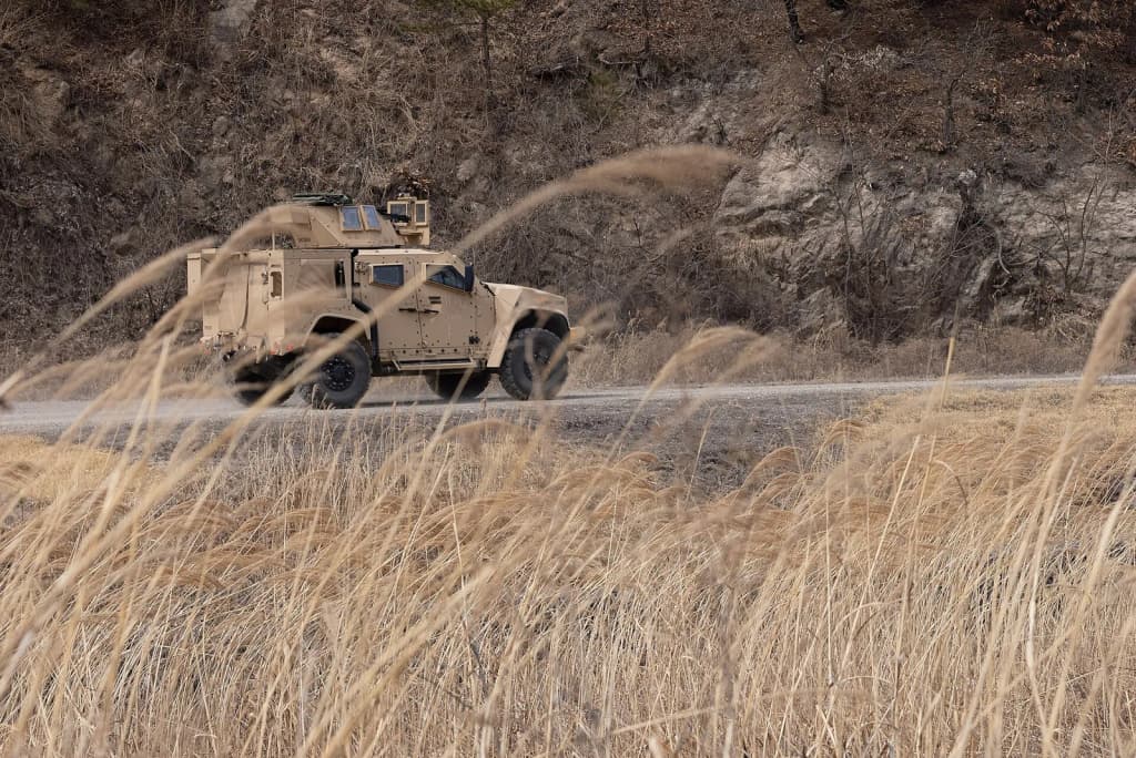 U.S. Marines with 3d Battalion, 12th Marine Regiment, 3d Marine Division participate in convoy maneuvers and immediate action drills during Korea Marine Exercis
