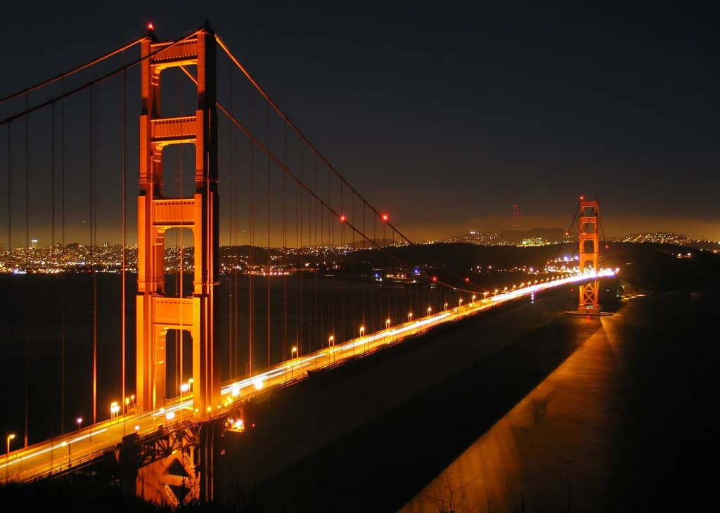 Golden Gate Bridge at looking south-south-east by night looking south across the Golden Gate towards San Francisco.