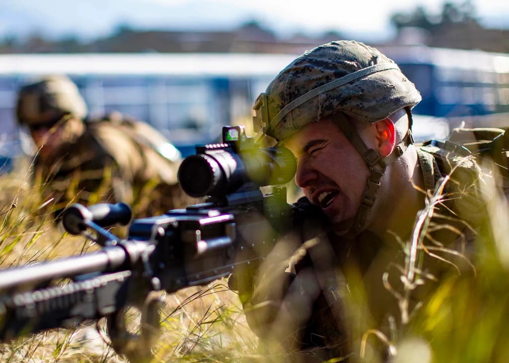 U.S. Marines assigned to Battalion Landing Team, 1st Battalion, 2nd Marine Regiment, 22nd Marine Expeditionary Unit, practice immediate action drills with a M24