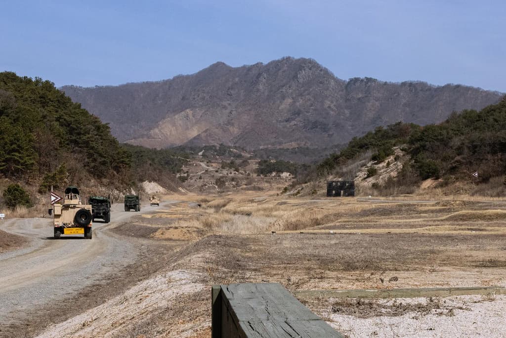 U.S. Marines with 3d Battalion, 12th Marine Regiment, 3d Marine Division participate in convoy maneuvers and immediate action drills during Korea Marine Exercis