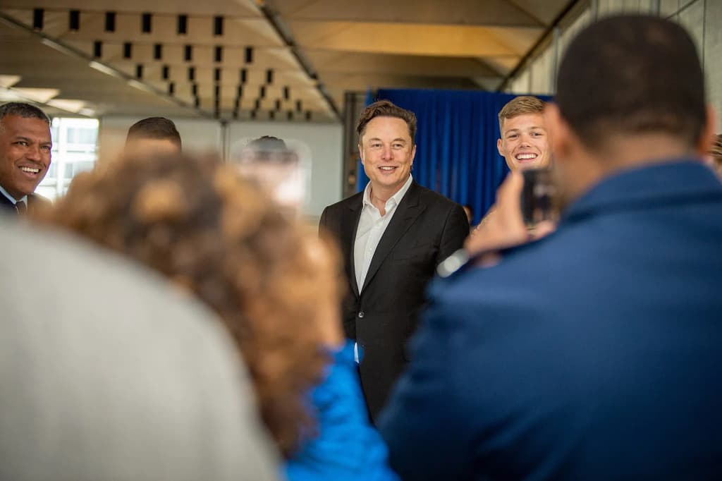 United States Air Force Academy , Colorado . -- Tesla Chief Executive Officer Elon Musk poses for a photograph with U.S. Air Force Academy Cadets in Mitchell Ha