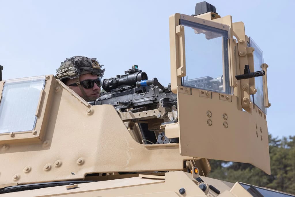 A U.S. Marine with 3d Battalion, 12th Marine Regiment, 3d Marine Division participate in convoy maneuvers and immediate action drills during Korea Marine Exerci