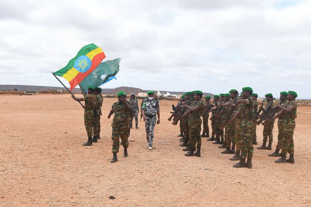 The Police Commissioner of the African Union Mission in Somalia (AMISOM), Assistant Inspector General of Police (AIGP), Augustine Magnus Kailie, inspects a guar