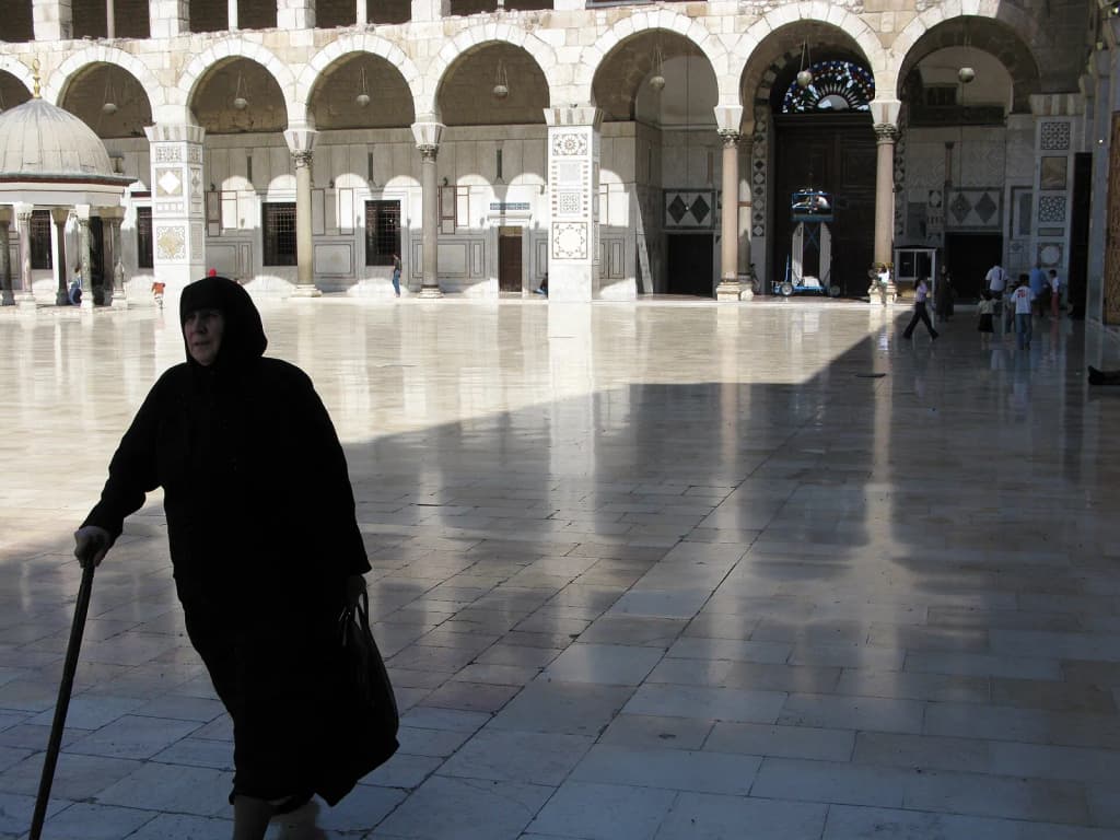 Damascus, Syria: The Umayyad Mosque courtyard. The Great Mosque of Damascus is one of the largest and oldest mosques in the world. The ground plan of the Umayya