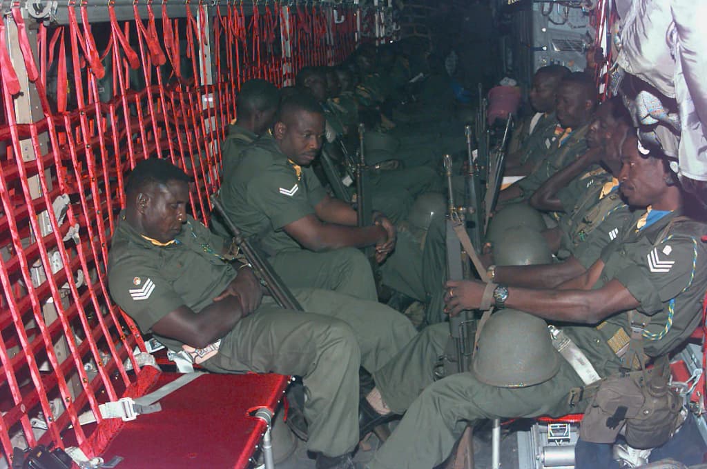 Economic Community Military Observation Group 13 (ECOMOG) Ghana Army Troops are being transported on a United States Air Force C-130E Hercules aircraft assigned