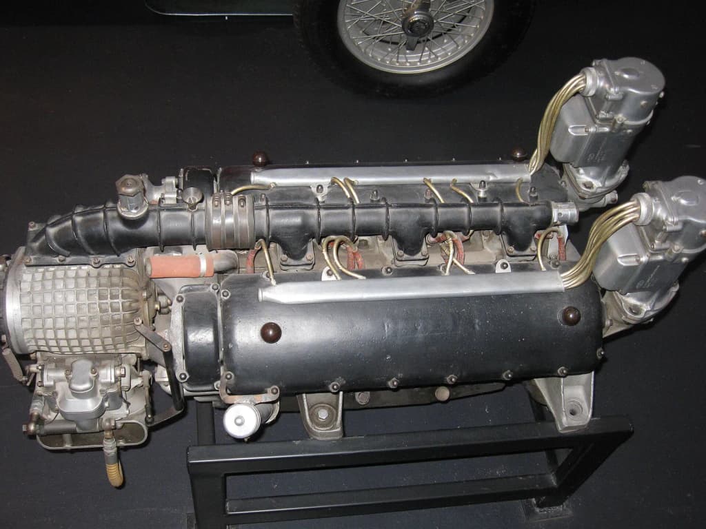 A very early Ferrari V12 supercharged Formula One racing engine designed by Giacchino Columbo, raced during the late 1940's. Picture taken at the Cité de l'Auto