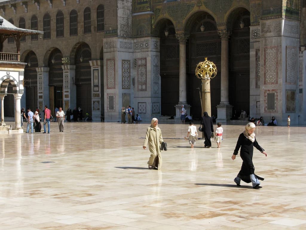 Damascus, Syria: The courtyard of the 8th-century Umayyad Mosque. The Umayyad Mosque, located in the old city of Damascus, is one of the largest and oldest mosq