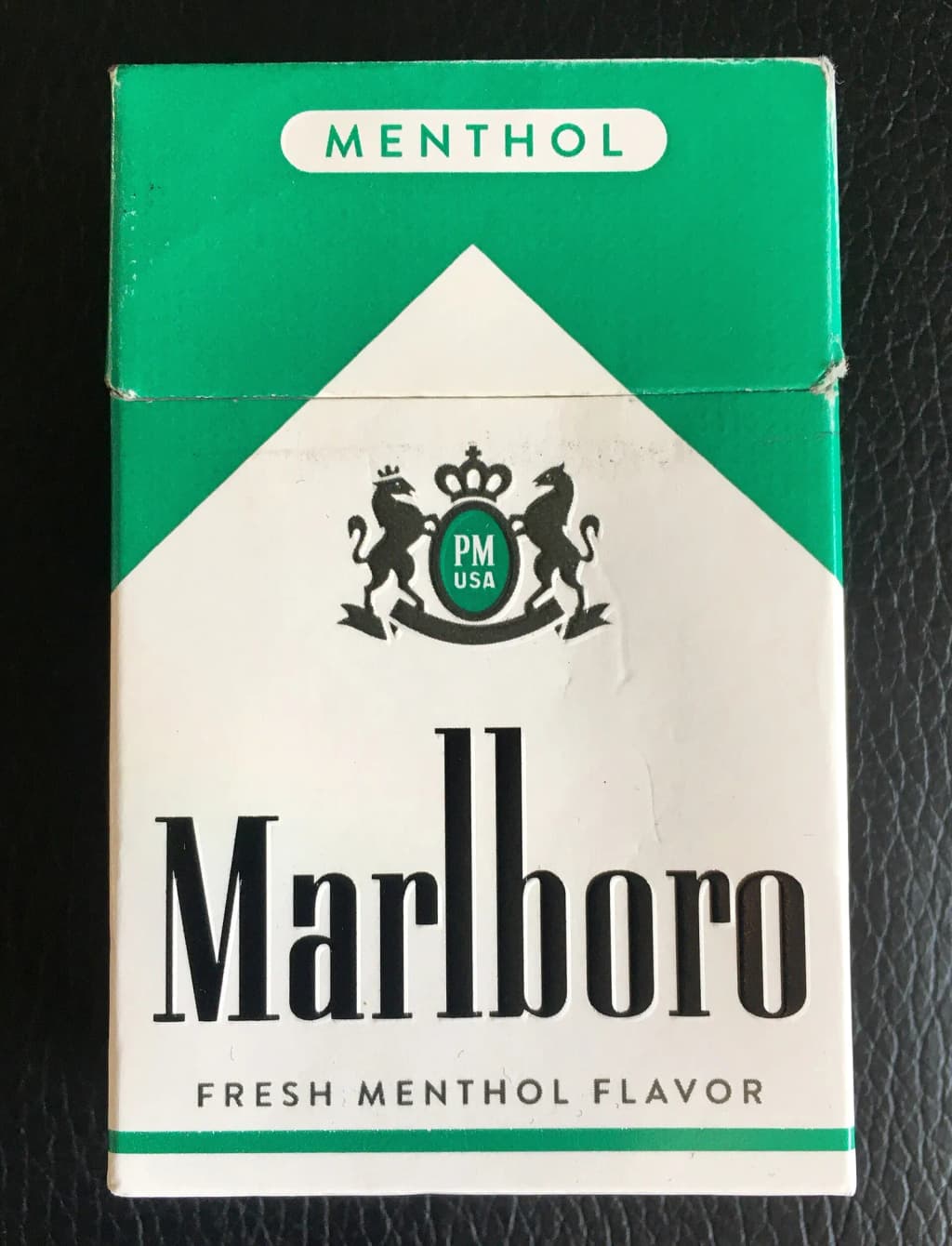 Marlboro Menthol cigarette pack (2023) from US duty-free shop. The packet has no health warning signs or images of smoking-induced sicknesses, which are nearly